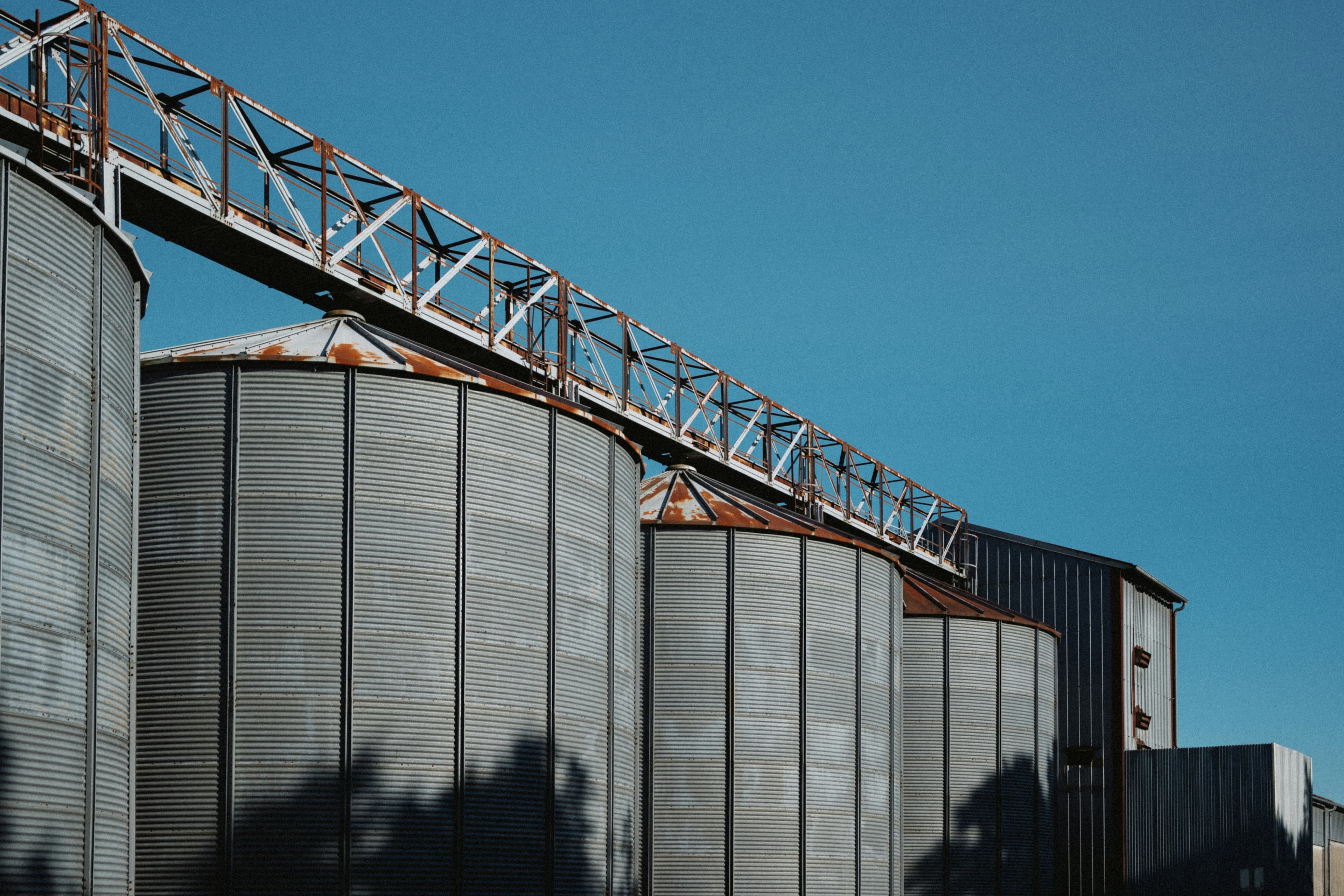 Grain silos against a clear sky